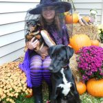 Witch with two dogs