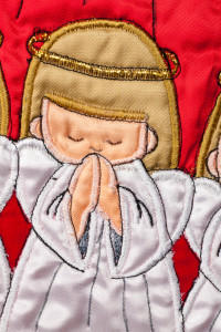 christmas stocking decorated with praying angel